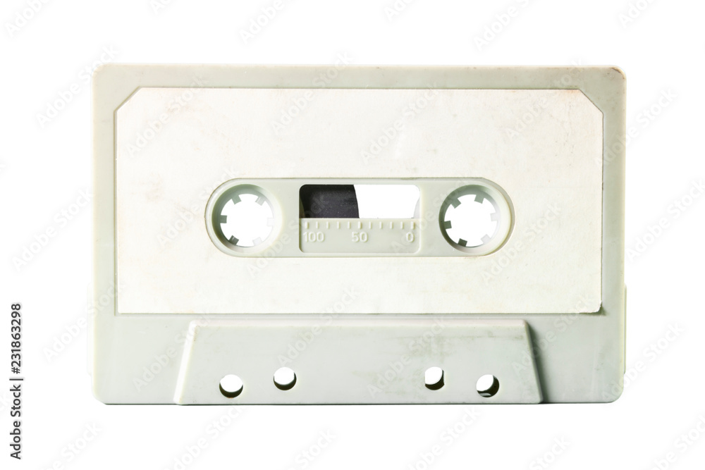Fototapeta premium An old vintage cassette tape from the 1980s (obsolete music technology). White label, light gray plastic body, isolated.