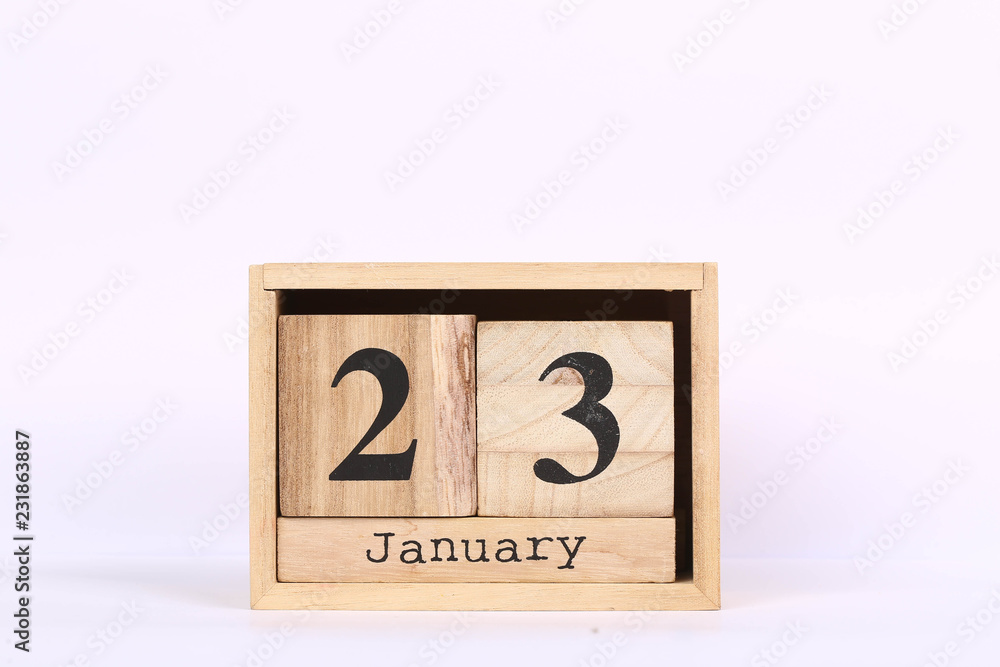 Wooden cubes calendar with the date of January 23. Concept calendar for year with copy space isolated on white background Wooden cubes calendar with the date of January 23. Concept calendar for year with copy space isolated on white background
