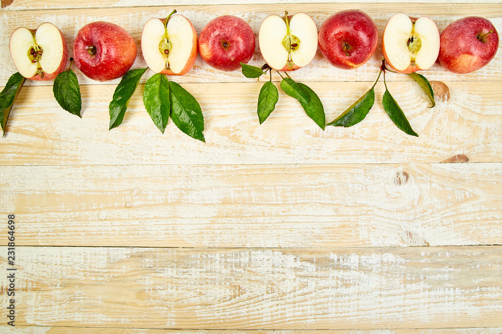 Fresh red ripe apples fruits whole and sliced Fresh red ripe apples fruits whole and sliced
