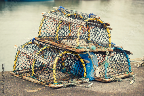 Fishing traps, lobster pots at harbor