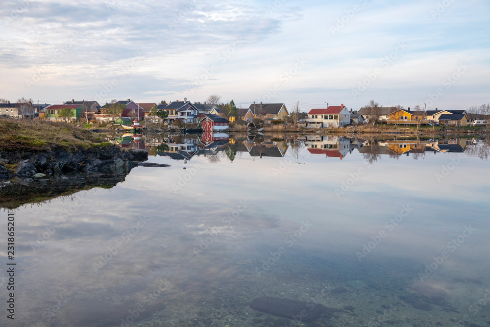 Part of the Bronnoysund development is reflected in the sea,Nordland county