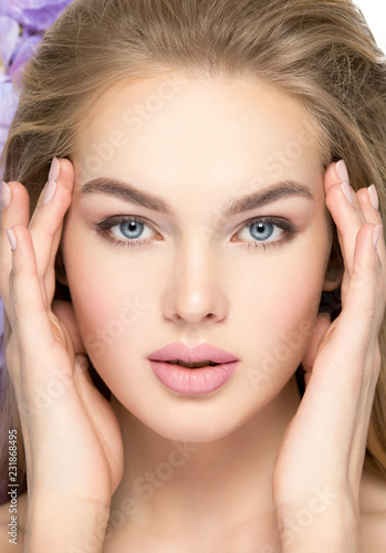 Wallpaper Mural Beautiful young blonde woman with flowers near face Torontodigital.ca