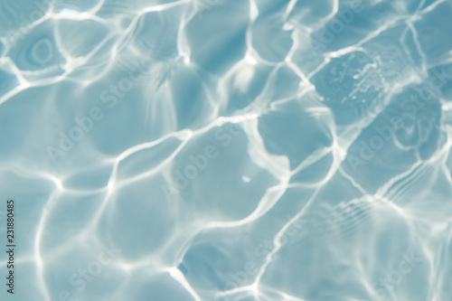 Blurred Beautiful Abstract water background, Swimming pool rippled.