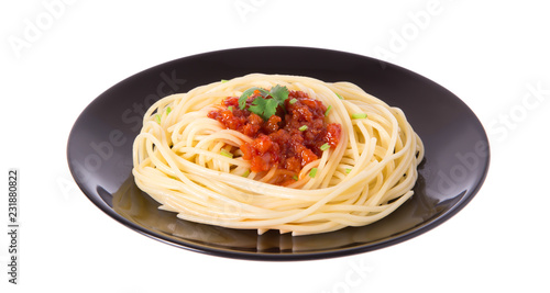Spaghetti in dish isolated on white background