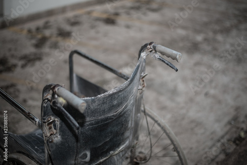 Old wheelchair in dark tone. © toeytoey