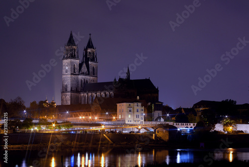 Magdeburg Germany by night cityscape over the river Elbe