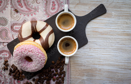 Two espressoes with two donuts ... © NeZla