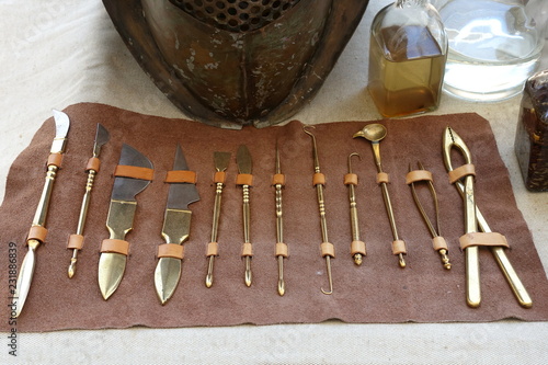 Various ancient Roman scalpels and other surgical instruments made from brass and steel