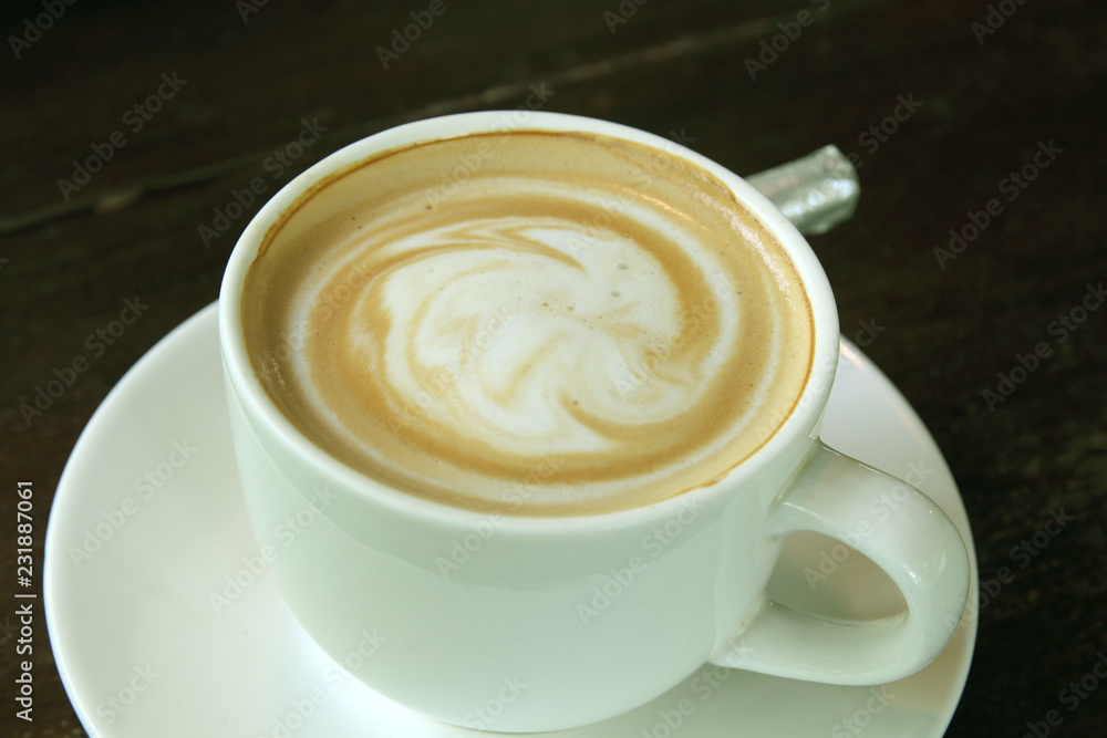 Cup of hot coffee on a old wooden table. Cup of hot coffee on a old wooden table.