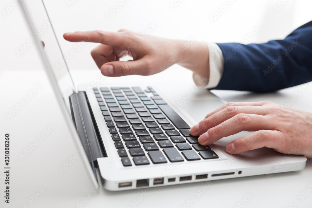 Close Up of businessman hands using laptop computer Close Up of businessman hands using laptop computer
