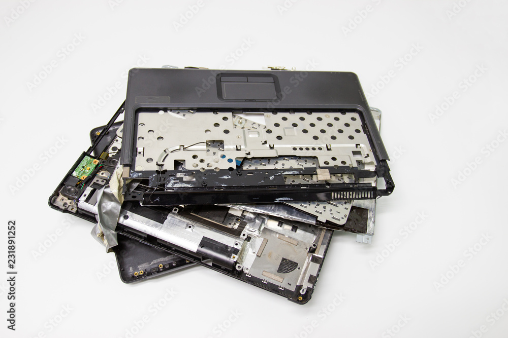 A broken old Computer laptop and notebook crash concept Laptop disassembling in repair shop A broken old Computer laptop and notebook crash concept Laptop disassembling in repair shop
