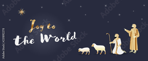 Christmas time. The shepherds in the fields with sheeps. Text : Joy to the world.