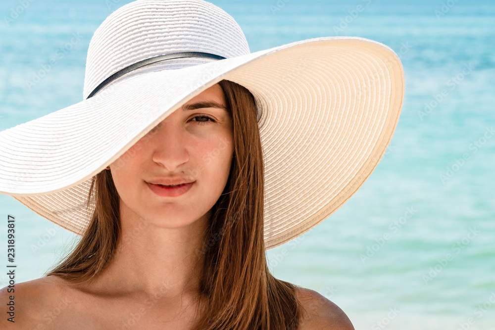 Young Woman Portrait With White Beach Hat