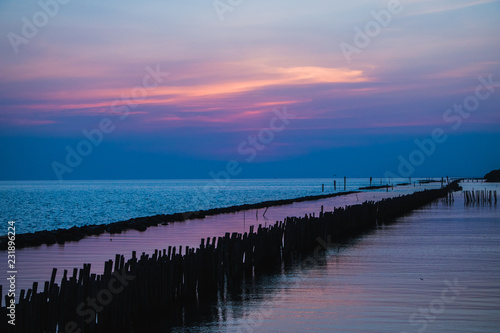 pier at sunset © Theerasak