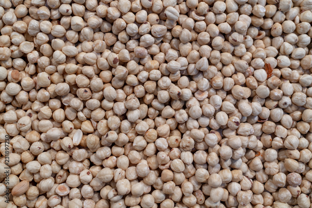 Hazelnut Background. Heap of peeled hazelnuts.. Hazelnut Background. Heap of peeled hazelnuts..