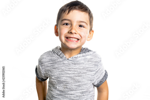 Boy having fun on studio white background