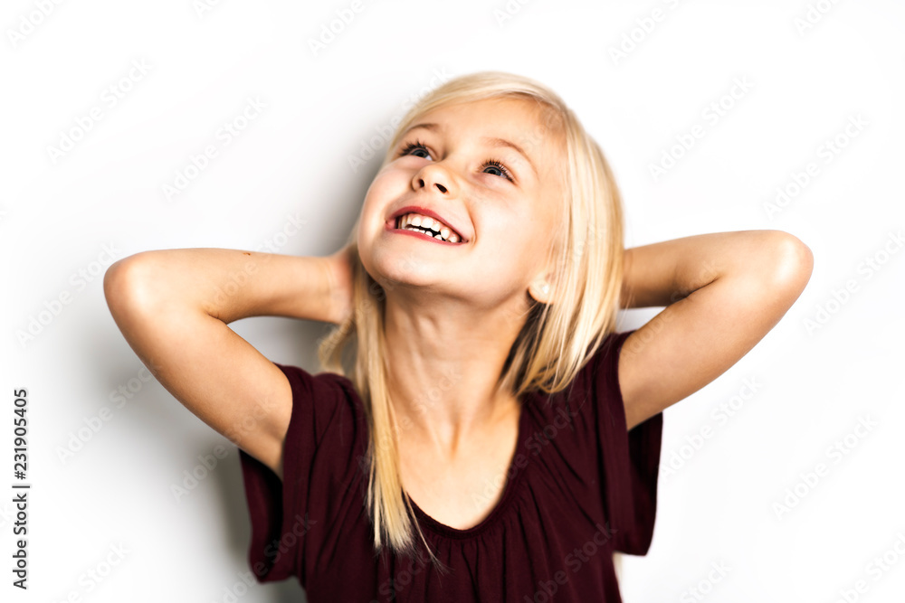 A Cute girl 5 year old posing in studio A Cute girl 5 year old posing in studio