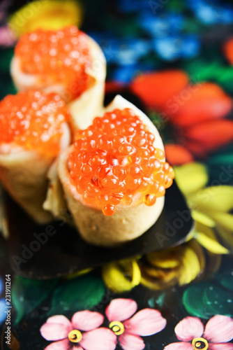 Russian Maslenitsa, pancakes with red caviar. Shrovetide, pancake week, carnival, shrove, pancake day photo