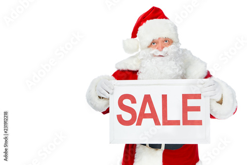 santa claus holding sale board isolated on white