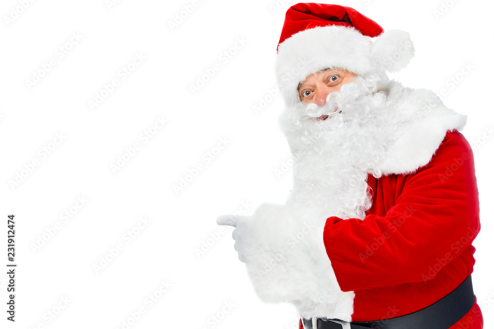 bearded santa claus pointing at something isolated on white bearded santa claus pointing at something isolated on white