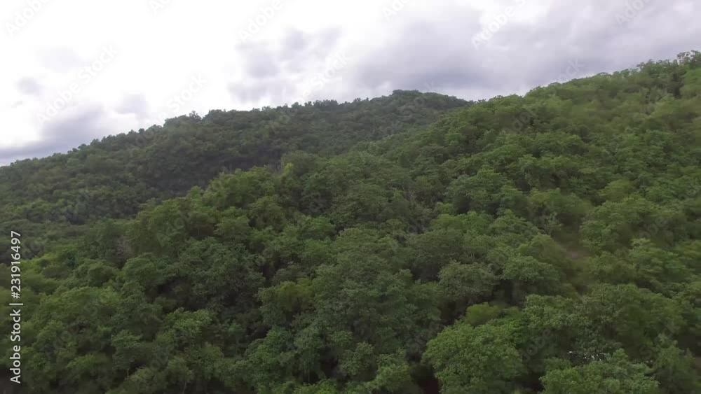 Mayaoyao, Ifugao, Philippines - August 27, 2018: Mountain tops replete with natural grown trees. drone aerial Mayaoyao, Ifugao, Philippines - August 27, 2018: Mountain tops replete with natural grown trees. drone aerial