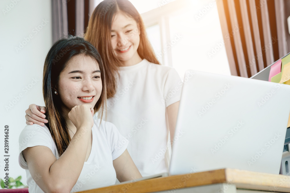 Young asian girl is freelancer with her private business at home office, working with laptop, coffee, online marketing, Customer order and packaging or packing. Young asian girl is freelancer with her private business at home office, working with laptop, coffee, online marketing, Customer order and packaging or packing.