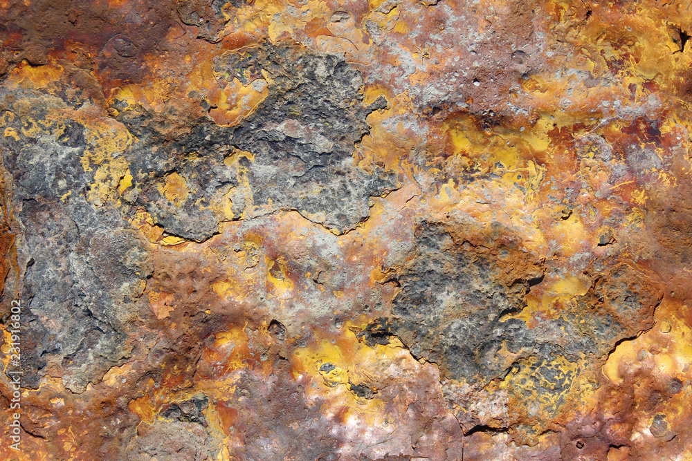 Rusted corroded yellow metal cast iron surface texture close up detail Rusted corroded yellow metal cast iron surface texture close up detail