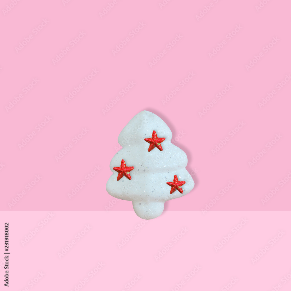 White glitter Christmas tree with red star on pink background for new year and christmas background, Minimal Concept White glitter Christmas tree with red star on pink background for new year and christmas background, Minimal Concept