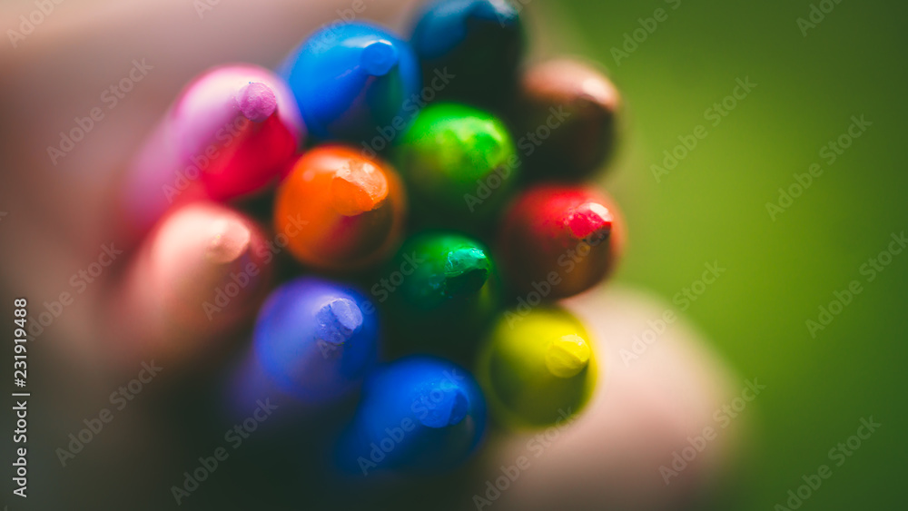 Crayon tips close-up. Shallow depth of field for dreamy impressional feel. Rainbow crayons Crayon tips close-up. Shallow depth of field for dreamy impressional feel. Rainbow crayons