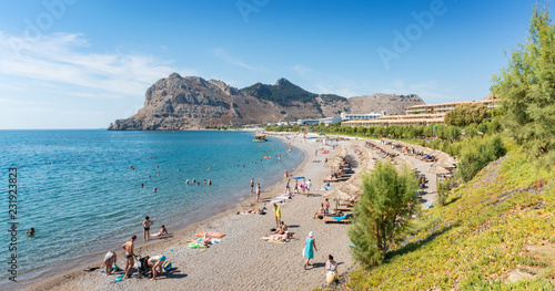 Fototapeta Naklejka Na Ścianę i Meble -  People enjoying their vacation on Kolymbia beach (Rhodes, Greece)