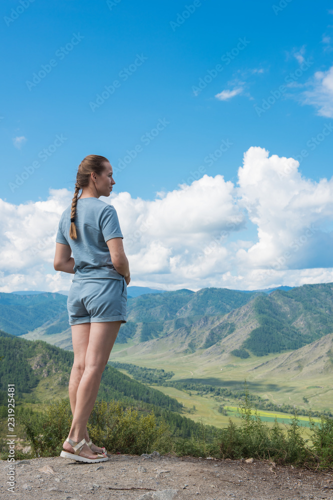 Woman portrait in he mountains Woman portrait in he mountains