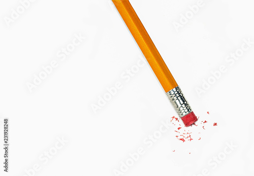 Photography close up of yellow pencil with eraser isolated on white paper