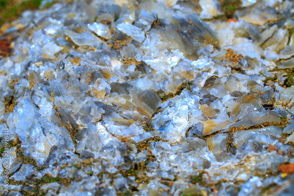 The mica sheets and quartz silicate minerals. Bare geological rock in ...