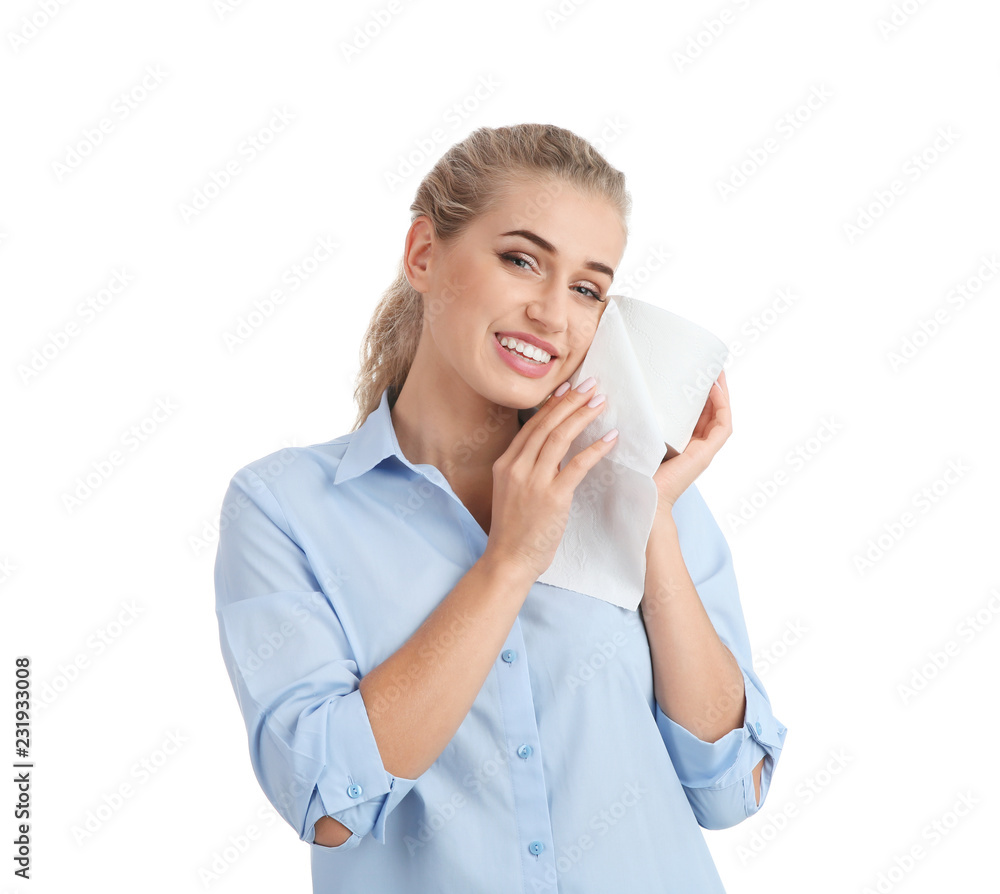 Beautiful young woman holding toilet paper roll on white background Beautiful young woman holding toilet paper roll on white background