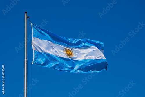 The flag of Argentina (Bandera argentina - Bandera Nacional) is a horizontal triband of light blue (top and bottom) and white with the Sun of May centered on the white band. Buenos Aires, Argentina