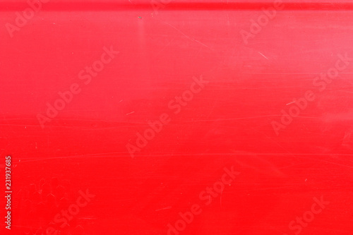 Bright red car metal paint detail scratches streaks specks lines reflection detail