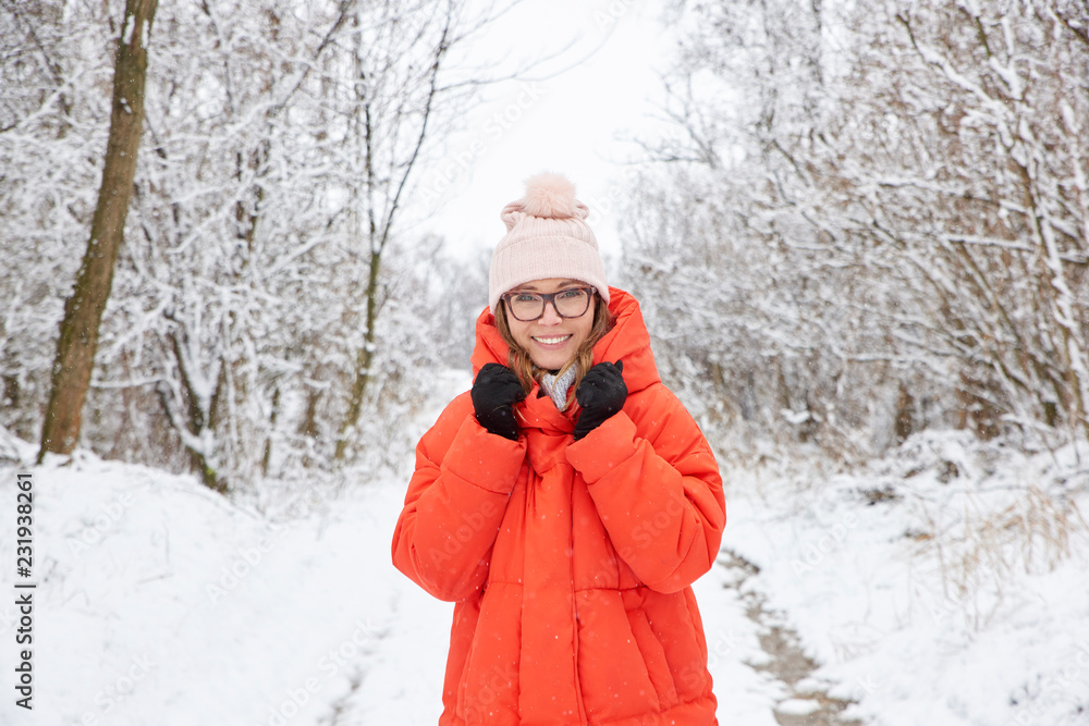 Fototapeta premium Woman portrait in snowy landscape