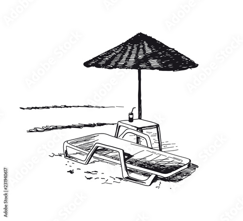 Beach view with chaise longue and parasol.