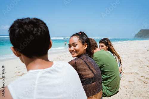portrait of togetherness with friends on the beach