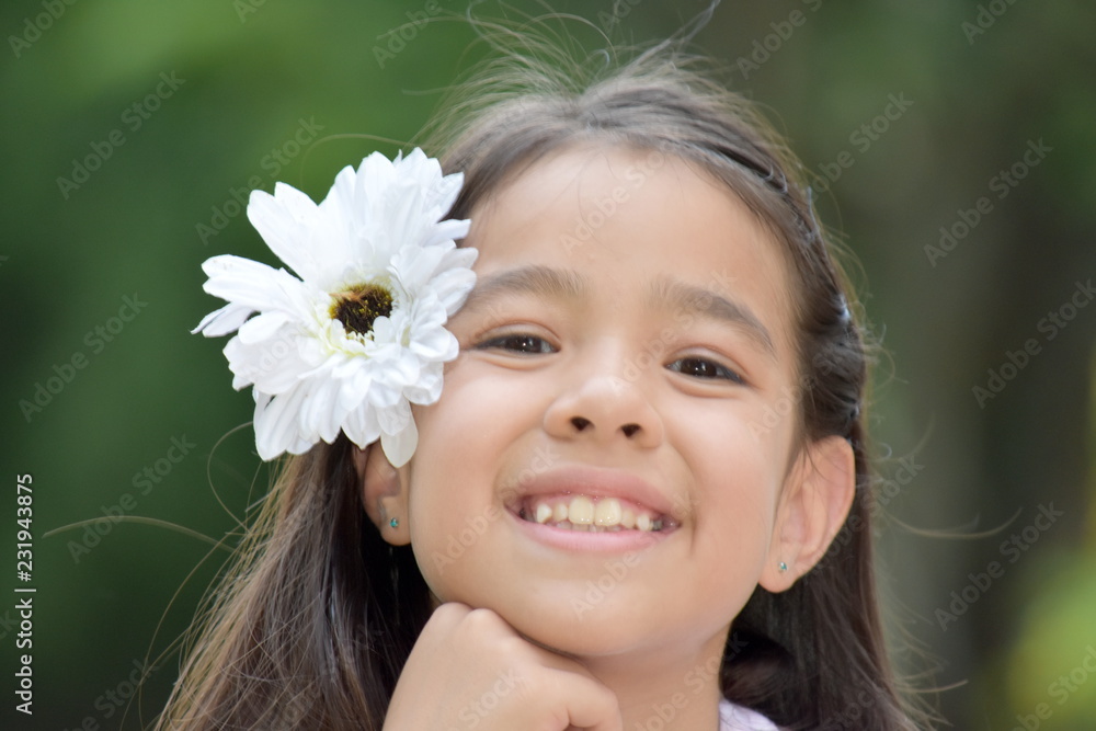 Smiling Minority Female With A Flower Smiling Minority Female With A Flower