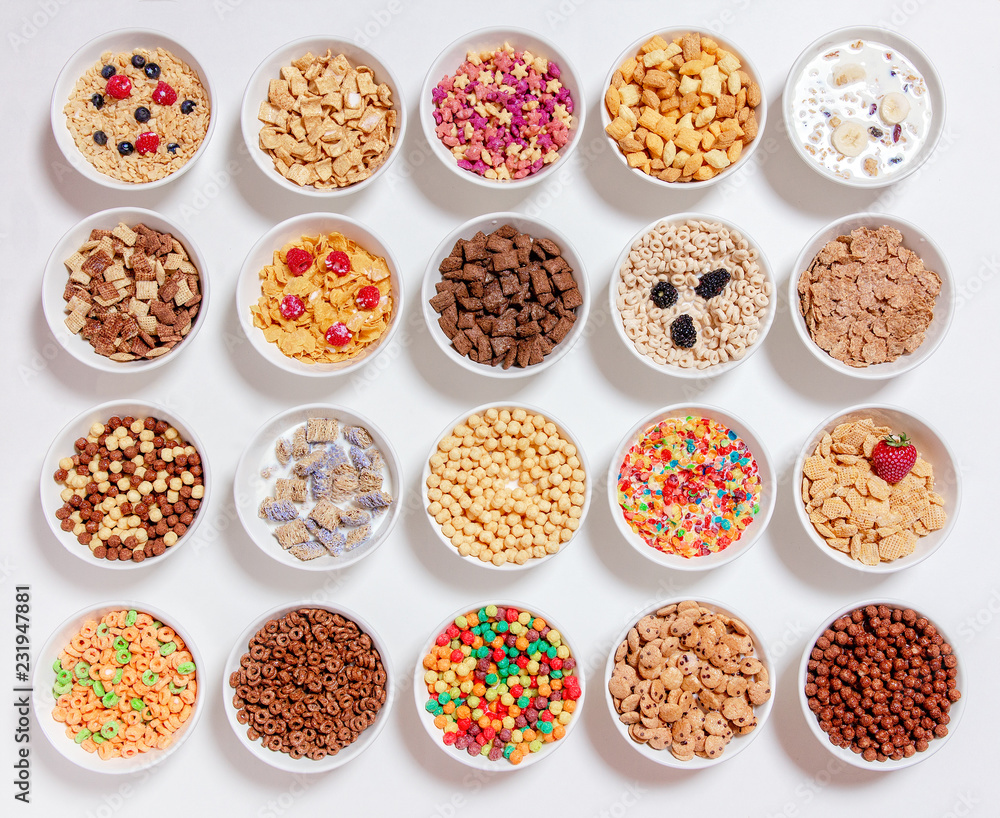 custom made wallpaper toronto digitalset of different cereals with milk on a white background. 20 bowls with cornflakes, kashi, cereals and berries. the concept of breakfast food. flat lay, top view