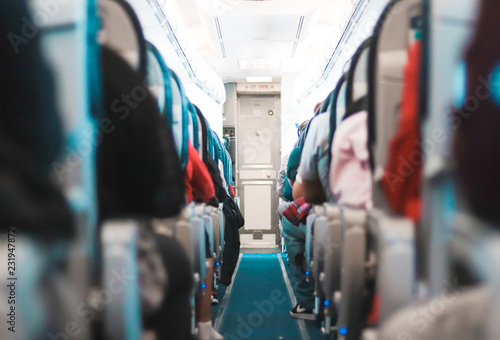 passengers sitting on an airplane © Jordan