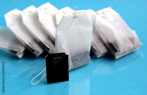 dry tea in white bags with a label