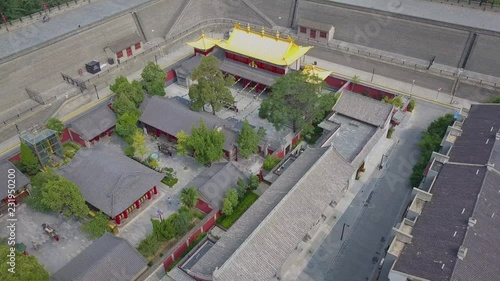 Aerial view over Guangren Temple inside Xi'an ancient city. Temple surrounded by walls. Xian, China photo