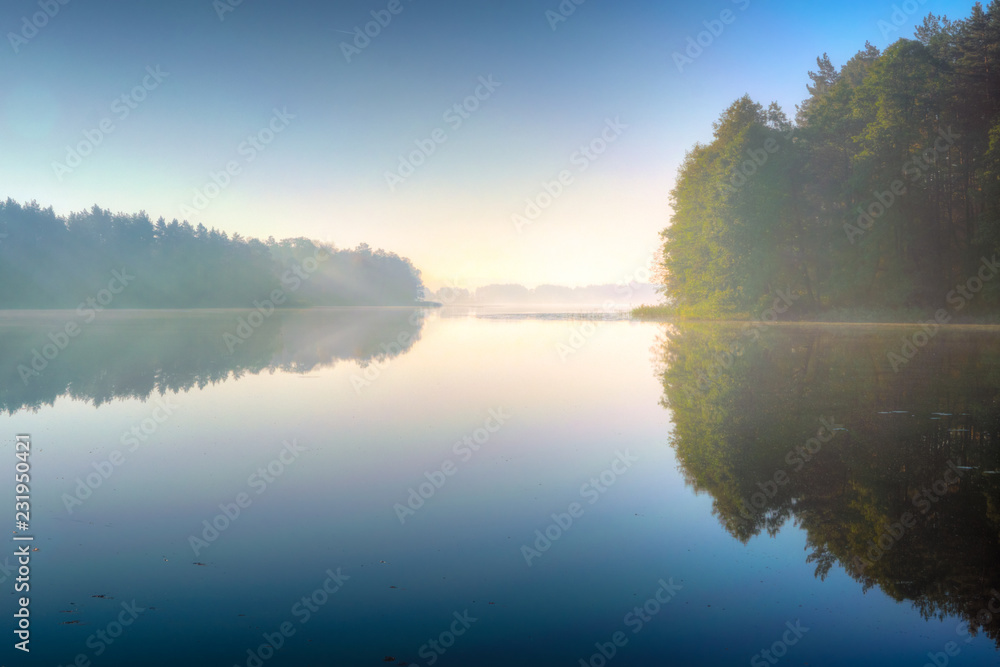 quiet Masurian lake in autumn. Poland.