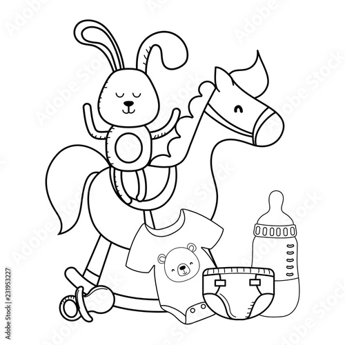 bunny and wooden horse in black and white