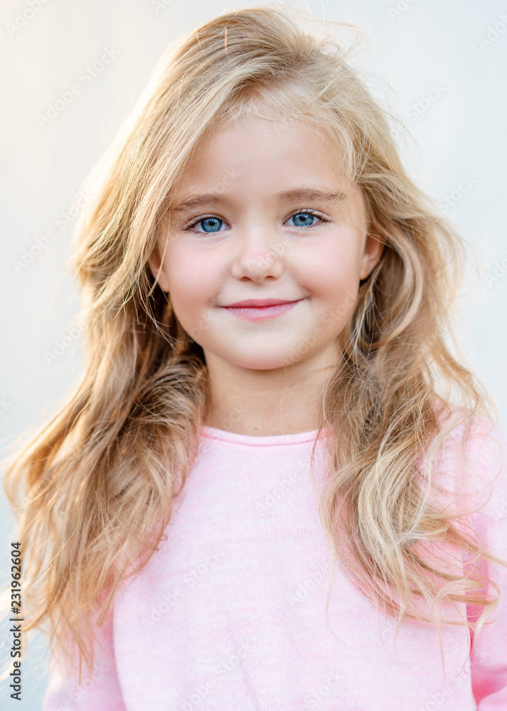 portrait of little girl outdoors in summer portrait of little girl outdoors in summer
