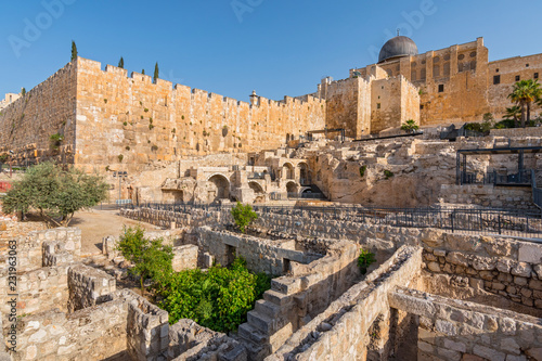 Dome of Al Aqsa Mosque surrounded by walls and ancient ruins in Old City of Jerusalem, Israel.
