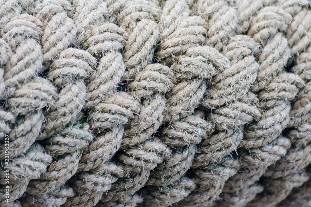 Old brown weathered rope texture. Details closeup.
