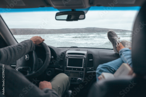 Car trip by cold sea in winter